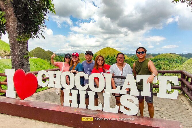 2025 Tarsier, Waterfalls & Chocolate Hills Tour - Pangas Waterfalls in Bilar: swim and jump time (with a towel)