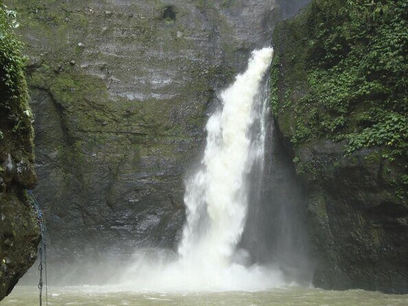 Amazing Pagsanjan Falls with Authentic filipino lunch Plus Transfers frm manila</em> – Manila to Pagsanjan: your 7:00 am start and AC comfort’ /><br />
You start early—pickup and departure are set for <strong>7:00 am</strong>—because Pagsanjan Falls is worth doing at a relaxed pace. The ride out of Manila is by <strong>air-conditioned vehicle</strong>, which matters more than you’d think when the day turns hot and humid once you’re near the river. Expect a long-but-doable trip time; plan for roughly 2.5 hours out of the city before you’re on the water.</p>
<p><p>This tour also uses select Manila pickup areas, which is great if you’re staying in the zone they serve. If you’re flexible, that’s a big value point: you’re paying for round-trip transfers, not just admission.</p>
</p>
<div style="margin: 20px 0; padding: 15px 0;"><p>You can also read our reviews of more tours and experiences in Manila.</p><ul style="margin: 10px 0; padding: 0; list-style: none;"><li style="margin: 0 0 10px 0; padding: 0 0 10px 0; border-bottom: 1px solid #eee; display: flex; align-items: flex-start; gap: 12px; line-height: 1.4;"><a href="https://thephilippinestraveler.com/intramuros-manila-historical-bamboo-bike-tour/" aria-hidden="true" tabindex="-1"><img decoding="async" style="width: 80px; height: 60px; object-fit: cover; border-radius: 4px; flex-shrink: 0;" src="https://cd.thephilippinestraveler.com/wp-content/uploads/intramuros-manila-historical-bamboo-bike-tour-150x150.jpg" alt="" loading="lazy"></a><div><a href="https://thephilippinestraveler.com/intramuros-manila-historical-bamboo-bike-tour/">Intramuros, Manila: Historical Bamboo Bike Tour</a><br><span style="font-size: 0.82em; color: #555; margin-top: 2px;"><span style="color: #f5a623;">★</span> 4.8 &middot; 583 reviews</span></div></li><li style="margin: 0 0 10px 0; padding: 0 0 10px 0; border-bottom: 1px solid #eee; display: flex; align-items: flex-start; gap: 12px; line-height: 1.4;"><a href="https://thephilippinestraveler.com/experience-intramuros-with-bamboo-bicycle-ecotours/" aria-hidden="true" tabindex="-1"><img decoding="async" style="width: 80px; height: 60px; object-fit: cover; border-radius: 4px; flex-shrink: 0;" src="https://cd.thephilippinestraveler.com/wp-content/uploads/experience-intramuros-with-bamboo-bicycle-ecotours-150x150.jpg" alt="" loading="lazy"></a><div><a href="https://thephilippinestraveler.com/experience-intramuros-with-bamboo-bicycle-ecotours/">Experience Intramuros with Bamboo Bicycle – Ecotours</a><br><span style="font-size: 0.82em; color: #555; margin-top: 2px;"><span style="color: #f5a623;">★</span> 5.0 &middot; 508 reviews</span></div></li><li style="margin: 0; padding: 0; border-bottom: none; display: flex; align-items: flex-start; gap: 12px; line-height: 1.4;"><a href="https://thephilippinestraveler.com/manila-intramuros-chinatown-and-old-manila-half-day-tour/" aria-hidden="true" tabindex="-1"><img decoding="async" style="width: 80px; height: 60px; object-fit: cover; border-radius: 4px; flex-shrink: 0;" src="https://cd.thephilippinestraveler.com/wp-content/uploads/manila-intramuros-chinatown-and-old-manila-half-day-tour-150x150.jpg" alt="" loading="lazy"></a><div><a href="https://thephilippinestraveler.com/manila-intramuros-chinatown-and-old-manila-half-day-tour/">Manila: Intramuros, Chinatown, and Old Manila Half-Day Tour</a><br><span style="font-size: 0.82em; color: #555; margin-top: 2px;"><span style="color: #f5a623;">★</span> 4.8 &middot; 475 reviews</span></div></li></ul></div><h2 id="the-canoe-upstream-why-pagsanjan-feels-truly-different">The canoe upstream: why Pagsanjan feels truly different</h2>
<p> – The canoe upstream: why Pagsanjan feels truly different’ /><br />
The heart of this trip is the native <strong>canoe upstream</strong>. This is where Pagsanjan stops being a landmark and starts being a river journey. You’ll spend about <strong>3 hours</strong> in the waterfall experience segment, with your access tied to the admission included in the tour.</p>
<p><p>A canoe ride isn’t just for sightseeing—it changes the angle of everything. Instead of looking at the falls from one fixed spot, you’re moving through the landscape the falls created. It also helps explain why guides and boatmen do so much hands-on work; you’re not just sitting there, you’re traveling through conditions that require skill and attention.</p>
</p>
<p><p>One note to keep your plans realistic: if conditions make the upstream section unsafe, the route can be shortened. That doesn’t mean the day is ruined—it just means you should go in expecting <em>river reality</em>, not a guaranteed endpoint.</p>
</p>
<h2 id="bamboo-raft-under-the-falls-and-devils-cave">Bamboo raft under the falls and Devil’s Cave</h2>
<p><img width="669" height="446" decoding="async" src=