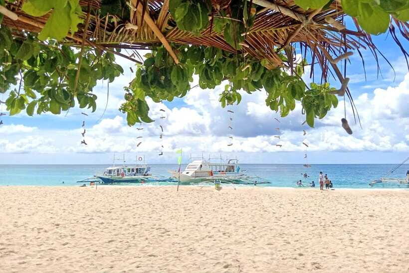 Boracay: Island Boat Tour with Crystal Cove Entry - The guides and crew: Jessie’s high-energy style