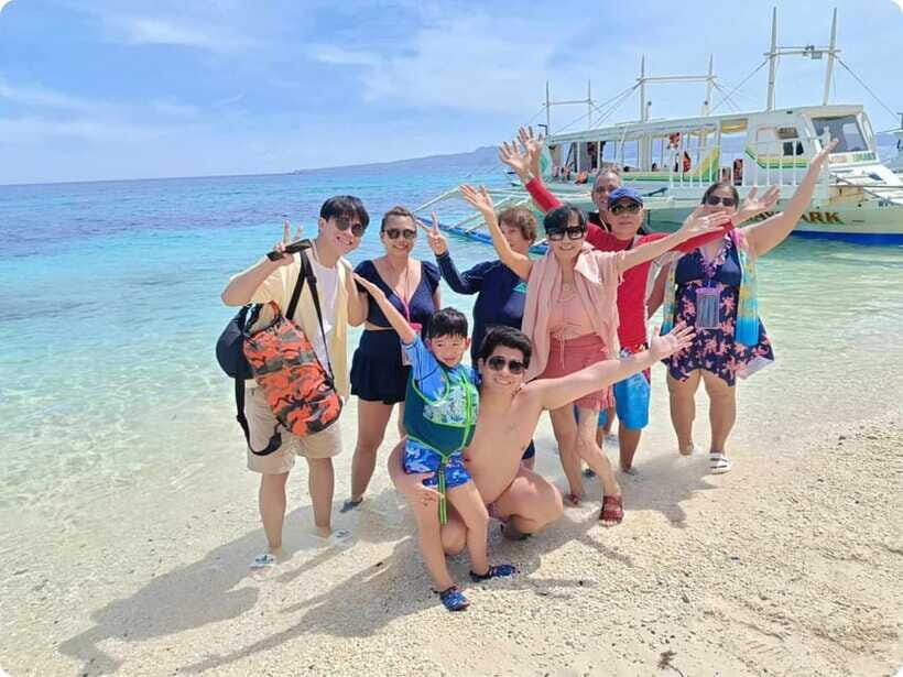 Boracay: Parasailing, Island Hopping, ATV Ride and Kawa Bath - Island hopping that actually gives you swim and photo time