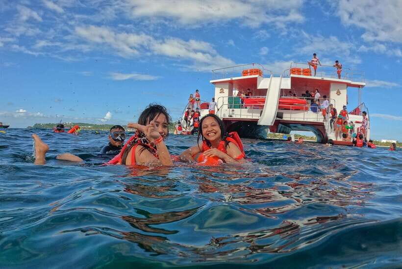 Boracay: Red Whale Party Cruise w/ Snacks & Water Activities - Getting afloat from Astoria Boracay in Balabag