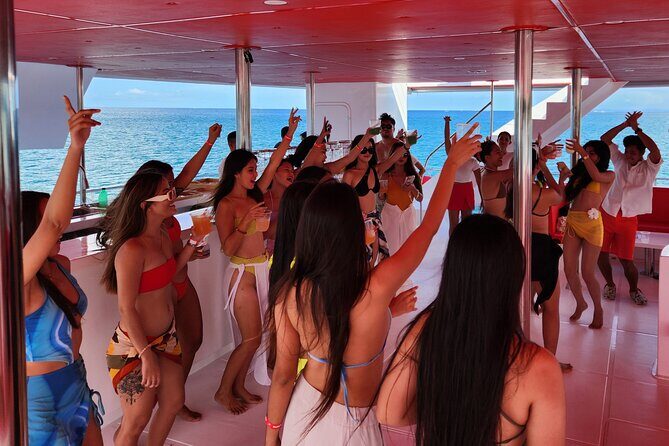 Boracay Sunset Cruise with Party DJ & Unlimited Food and Drinks - Stop 1: Angol Beach Cookies and Drinks Before the Fun Starts
