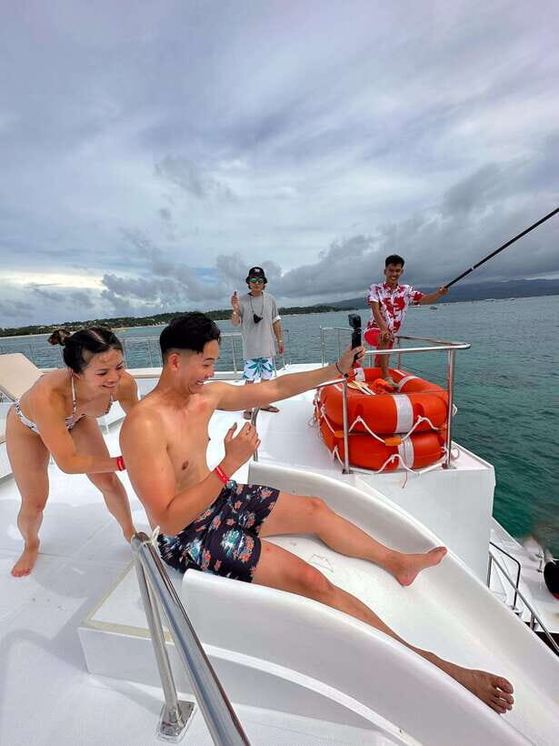 Boracay Sunset Cruise with RedWhale Party Yacht - The Sunset Party Vibe: DJ energy, rooftop lounging, and photo moments