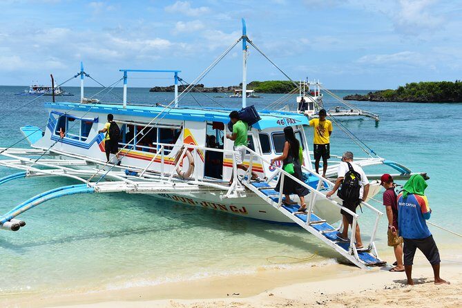 Caticlan Airport Transportation to Boracay Island Round Trip - Caticlan Jetty Port: Prepaid Fees and the Traditional Bangka Ride