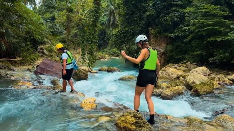 Cebu: Kawasan Falls Canyoneering Tour with Ziplining & Lunch - Kawasan Falls canyoneering: trek, swim, slide, and choose your jump
