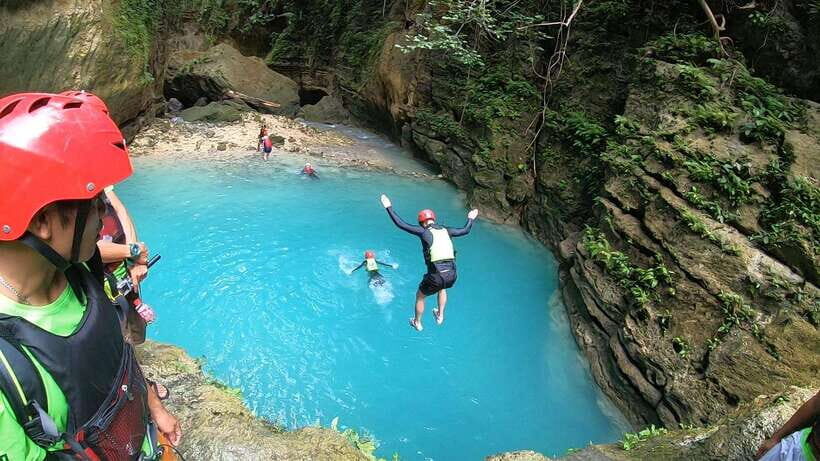 Cebu: Moalboal Sardines Run Snorkel & Kawasan Canyoneering - Kawasan canyoneering: slides, jumps, rappels, and the real safety culture