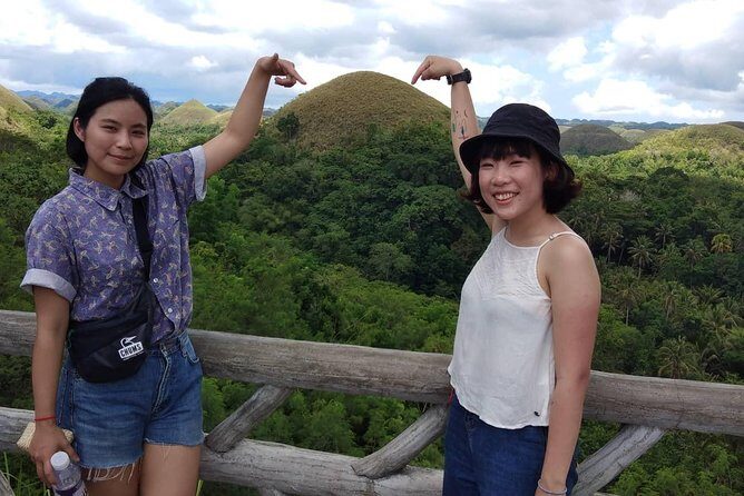 Chocolate hills tour with Tarsier & Loboc river Buffet Lunch (half-day tour) - Stop 1: Chocolate Hills Natural Monument and the stairs reality