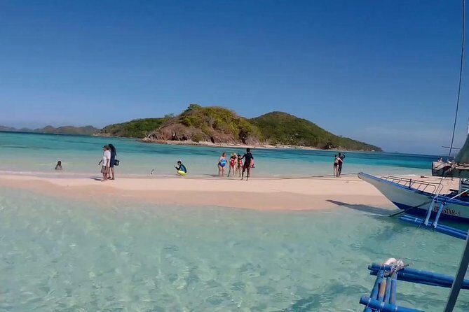 Coron Island Escapade Tour (Shared Tour) - Malcapuya Island: white sand and clear-water blues