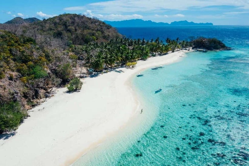 Coron Island Escapade Tour with Lunch - The boat ride setup: life vests and a smoother day