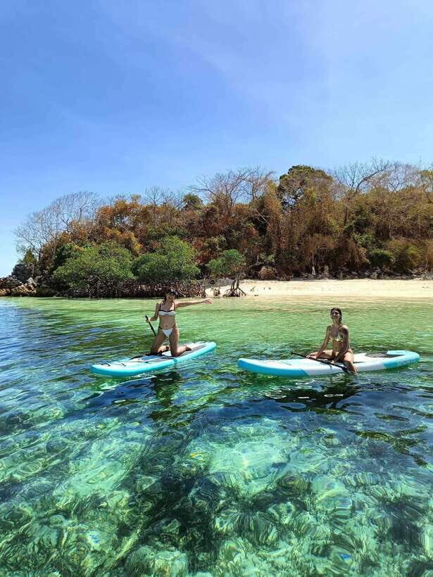 Coron Island: Premier Trimaran Tour - Hotel pickup, welcome drinks, and the first views from Coron Harbor