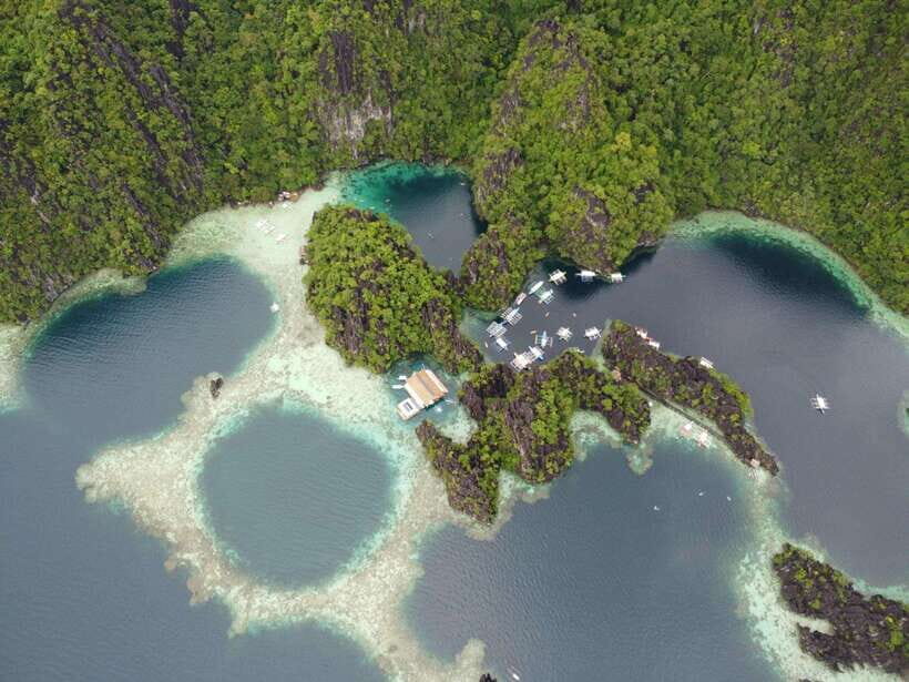 Coron: Kayangan Lake, Twin Lagoon, and Siete Pecados Tour - Twin Lagoon’s swim-through: the salt-to-fresh water trick