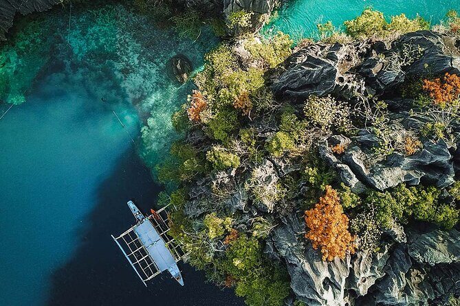 Coron Palawan Snorkeling & Island Hopping Tour (Private) - Kayangan Lake means stairs, then crystal-clear payoff