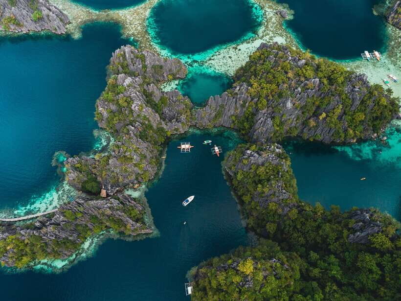Coron: Private Island-Hopping Tour on a Yacht or Speedboat - Getting There: Coron Harbor Square and Optional Hotel Pickup