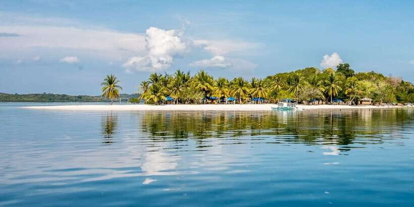 Coron Private Tour D: Reef and Wrecks - Pass Island: The White-Sand Reset Between Stops