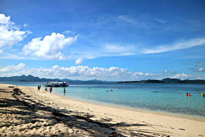 Coron Town: Coron Island Escapade Private Tour with Lunch - Malcapuya Island: White Sand, Crystal Water, and Palm-Backed Beach Time