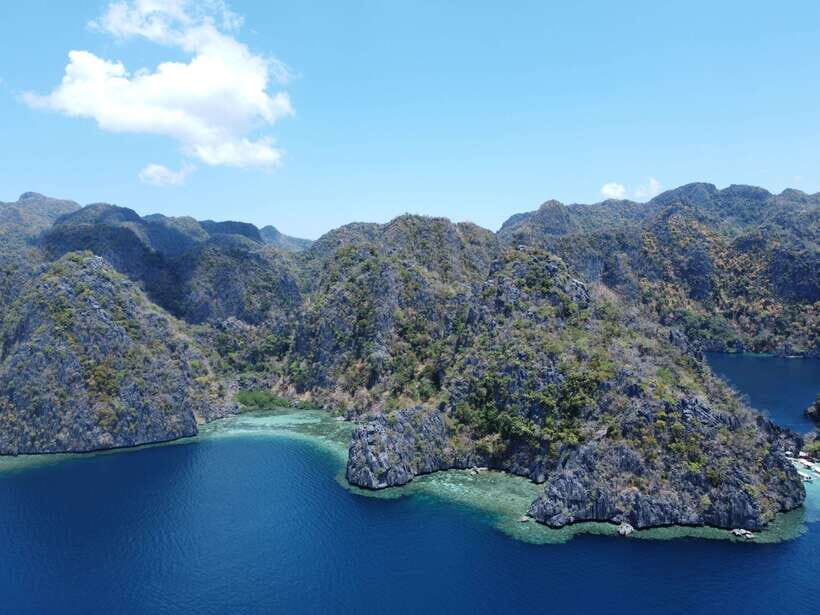 CORON:ISLAND TOUR A Lakes and Snorkeling with Corals - Kayangan Lake: viewpoint hike and a clean-water swim