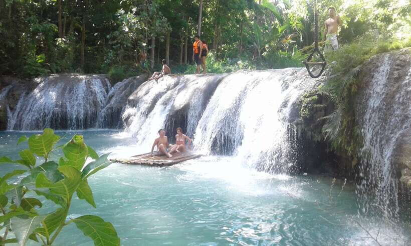 Dumaguete: Siquijor Island & Cambugahay Falls Private Tour - Getting there the easy way: van, ferry, and a 12-hour loop