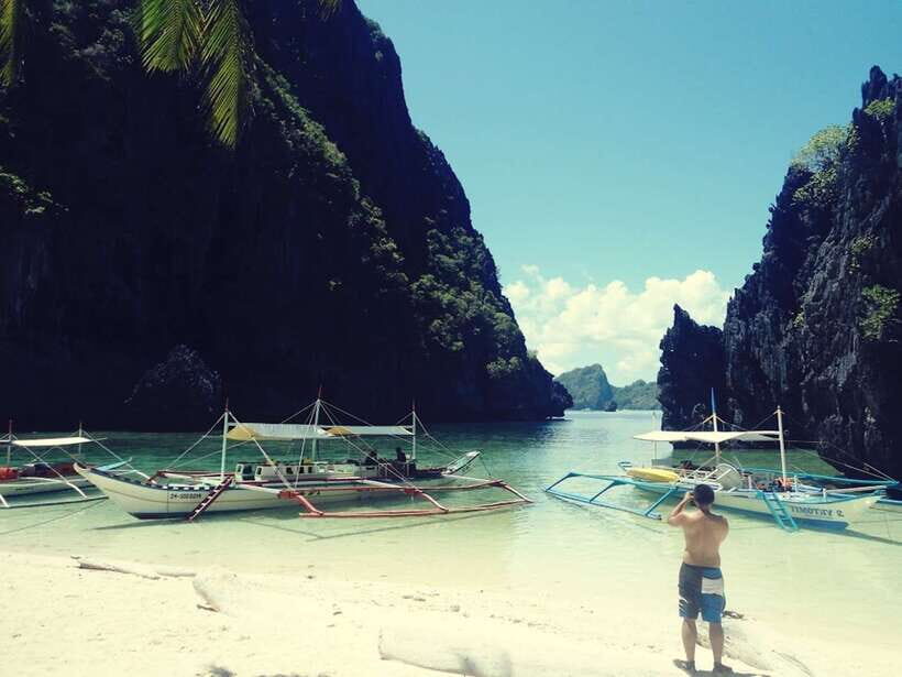 El Nido: Hidden Beaches and Lagoons Boat Hopping Tour D - From Marber’s Beach Club to crystal water: how the day moves