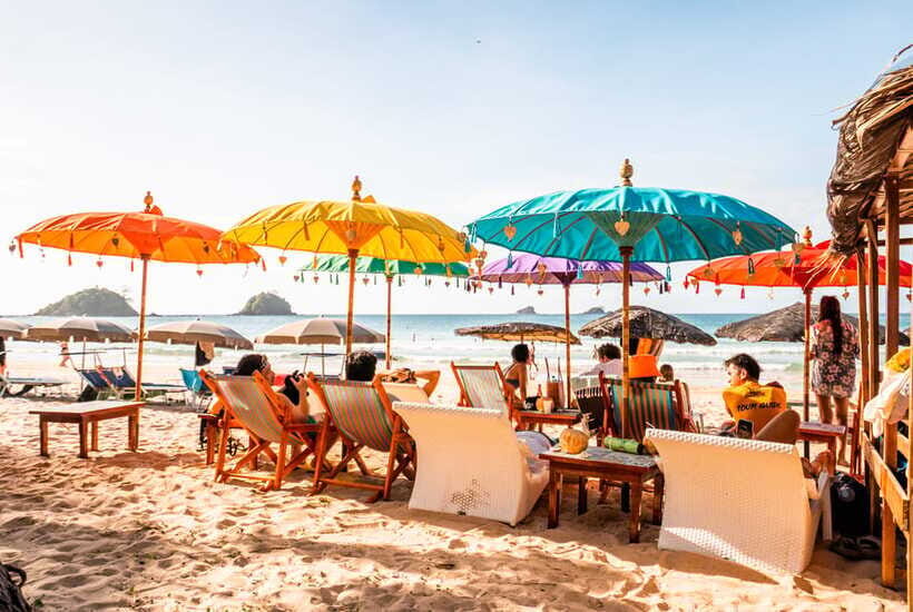 El Nido: Jeepney Adventure Tour with Lunch - Beach club pool access and the Frendz rooftop party finale