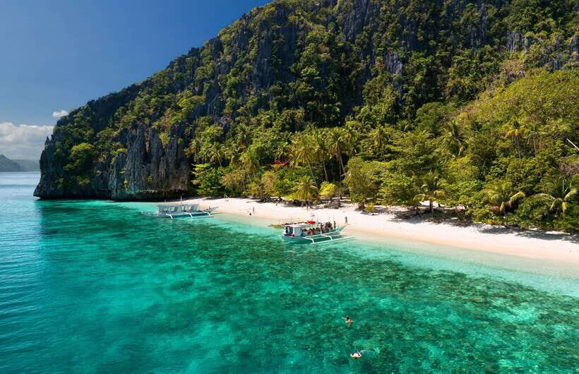 El Nido: Private/Exclusive Island Hopping Tour B BEST PRICE! - Entalula Island: the easy warm-up for sand, photos, and snorkeling