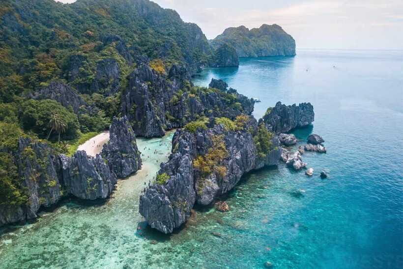 El Nido: Tour C to Hidden Beach, Helicopter Island & More - Secret Beach: limestone opening, big “wow,” and crowd math