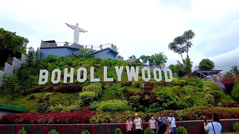 From Cebu: Bohol Countryside & Buffet Lunch Exclusive Tour - Loboc River floating restaurant lunch: the show makes it feel like place