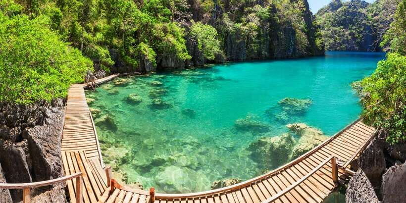 From Coron: Island Hopping Boat Day Trip with Buffet Lunch - Lunch on the Beach: Buffet, Fruit, and a Drink Reality Check