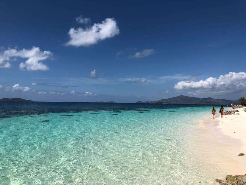 From Coron: Private Island-Hopping Cruise with Lunch - Bulog Dos: coral zones and the long sandbar effect