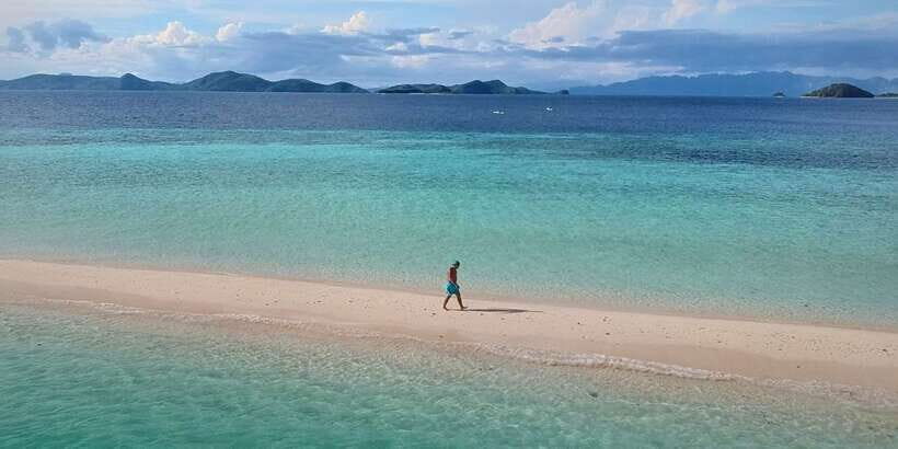 From Coron: Private Island-Hopping Cruise with Lunch - Your guide and boat day reality: what to expect on the water