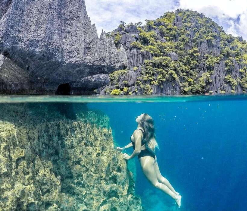 From Coron: Twin Lagoon and Skeleton Wreck Cruise with Lunch - Siete Pecados / Reef Garden: coral, fish, and better snorkel payoff