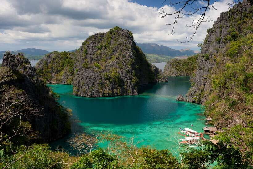 From Coron: Twin Lagoon and Skeleton Wreck Cruise with Lunch - Food, bottled water, fruit, and kayaking: included comfort that matters