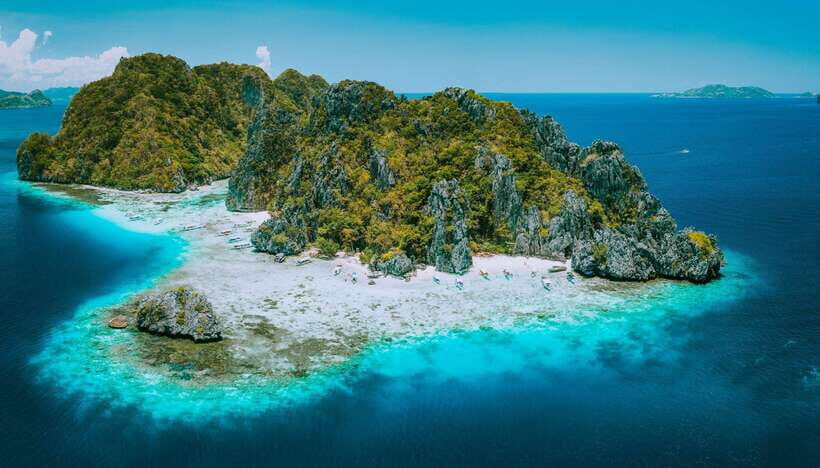 From El Nido: Island, Lagoons, and Beaches Boat Tour - Pasandigan Cove: where snorkel-less swimmers still enjoy the water