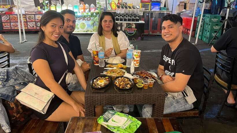 Makati Street food walking tour with Dinner - Open stand halls and live music set the tone