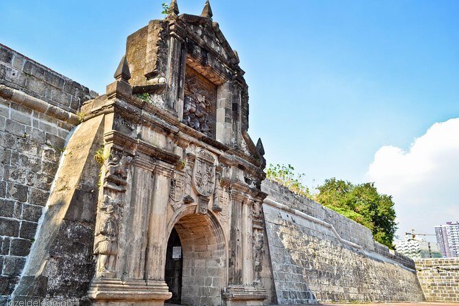 Manila Old and New: Sightseeing Tour Including Intramuros and Fort Santiago - Into Intramuros: Walls, Cobblestones, and a Short Walk That Adds Up