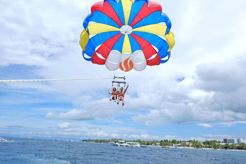 Panglao: Solo or Tandem Parasailing Experience near Alona - Getting There: RFS Watersports Booth by Aluna Beach Lounge