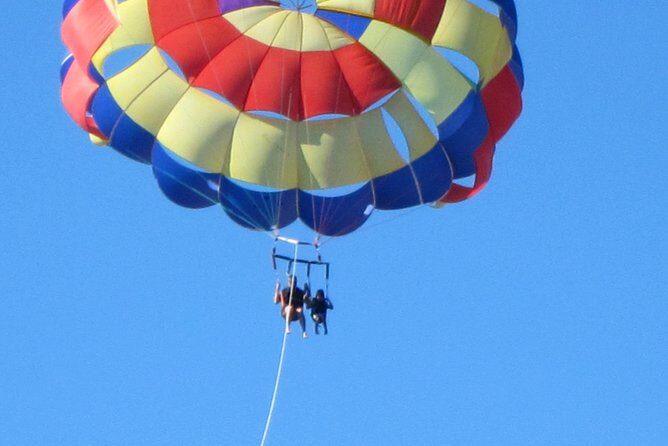 Parasailing - The Flight: Peak altitude views, near-silent moments, and tandem chat