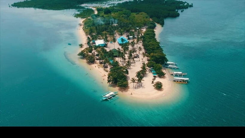 Puerto Princesa: Cowrie Island Guided Day Tour with Meal - Van to Honda Bay, Then a Short Motor-Boat Ride