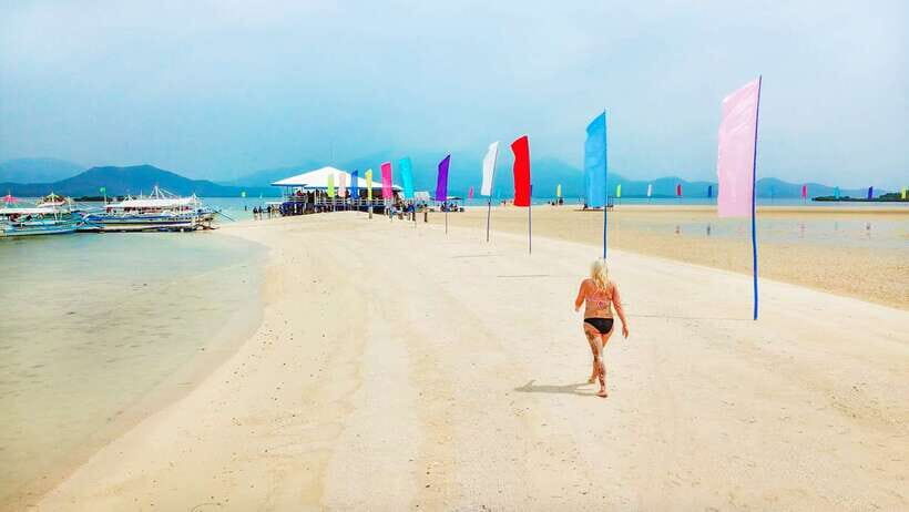 Puerto Princesa: Private Honda Bay Island Hopping Tour - Cowrie Island: The longest beach block and the best place for lunch