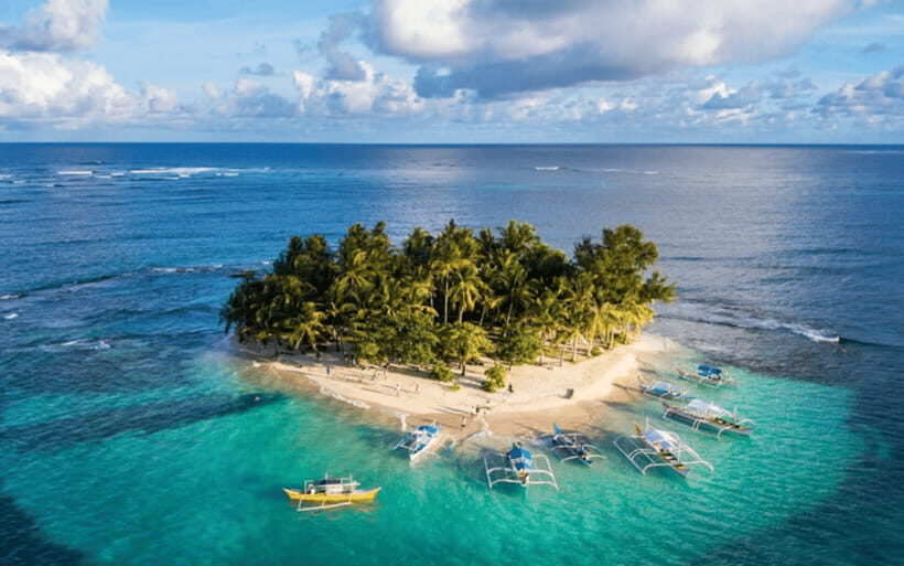 Siargao Tour I (Private Tour) - Daku Island: long white sand, clear water, and coconut shade